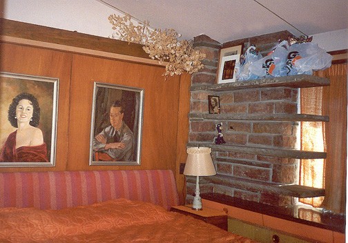master bedroom and portraits