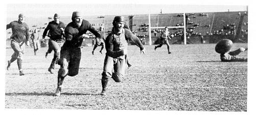 old black and white photograph of football game