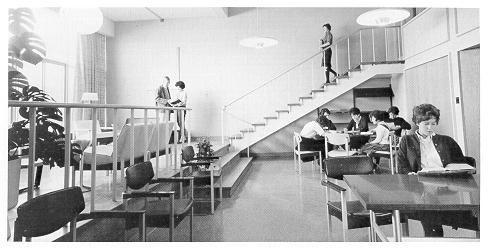 old black and white photograph of students studying inside North Hall lounge